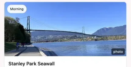 A day plan card: Stanley Park Seawall with a photo and description